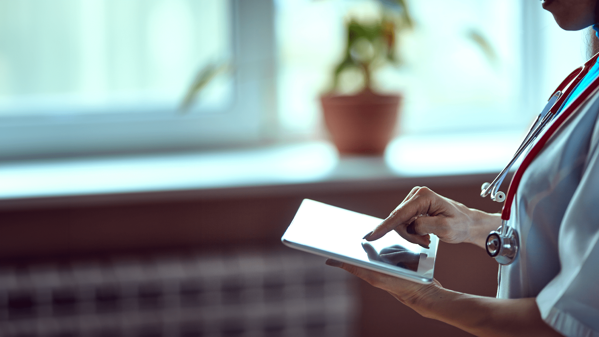 nurse with an ipad
